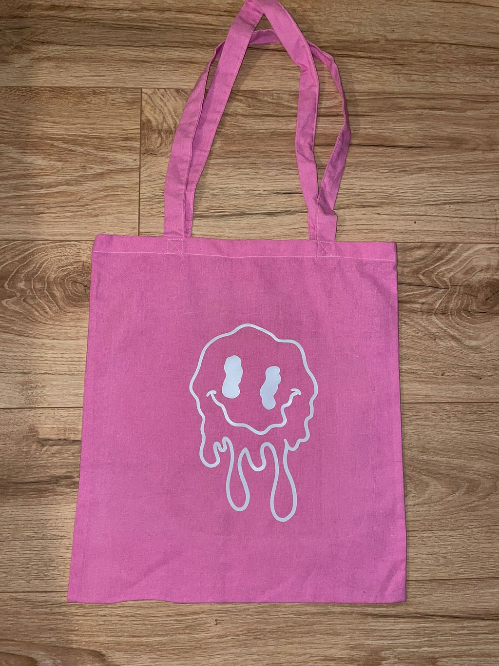 Drippy Smiling Face Tote Bag