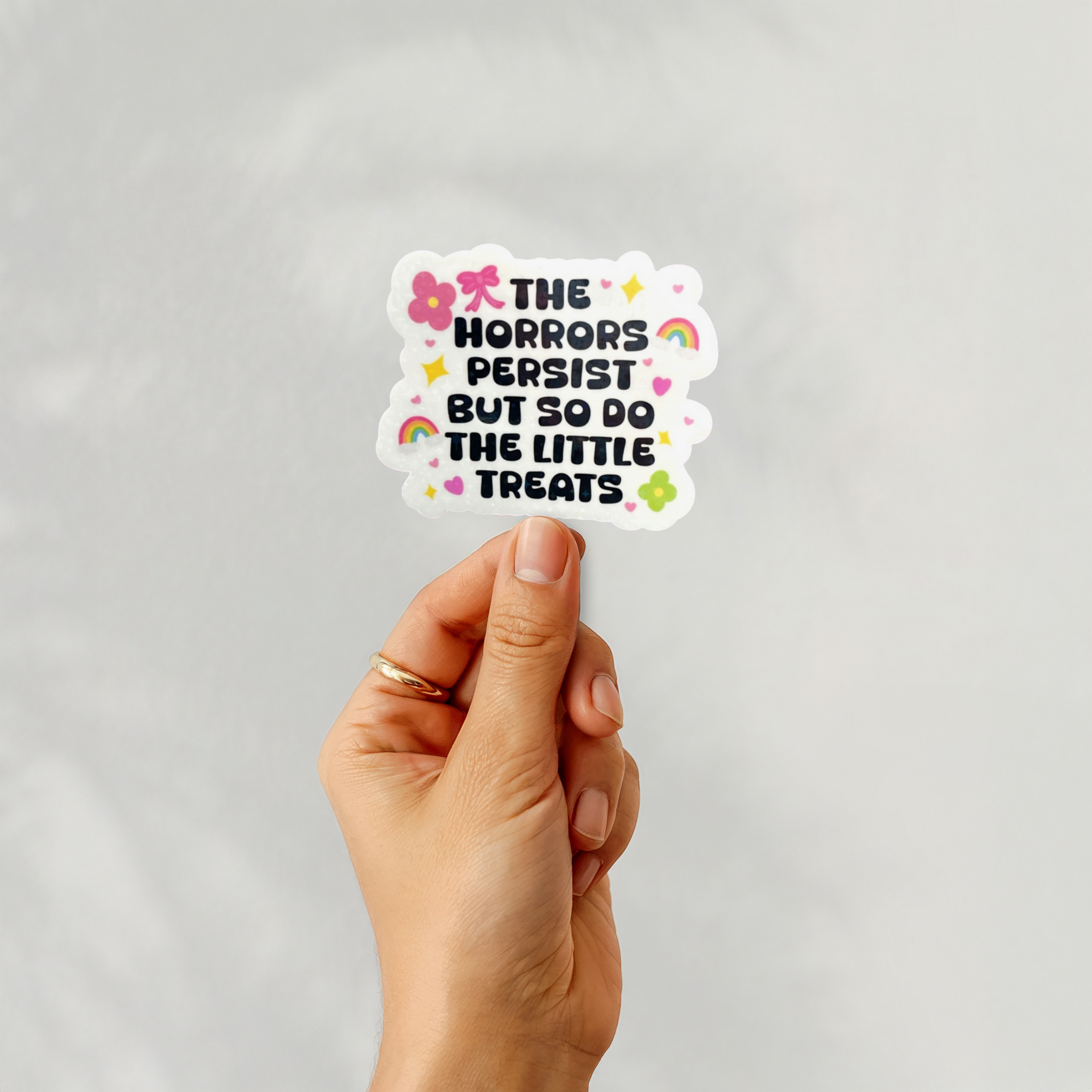 The Horrors Persist But So Do The Little Treats Sticker