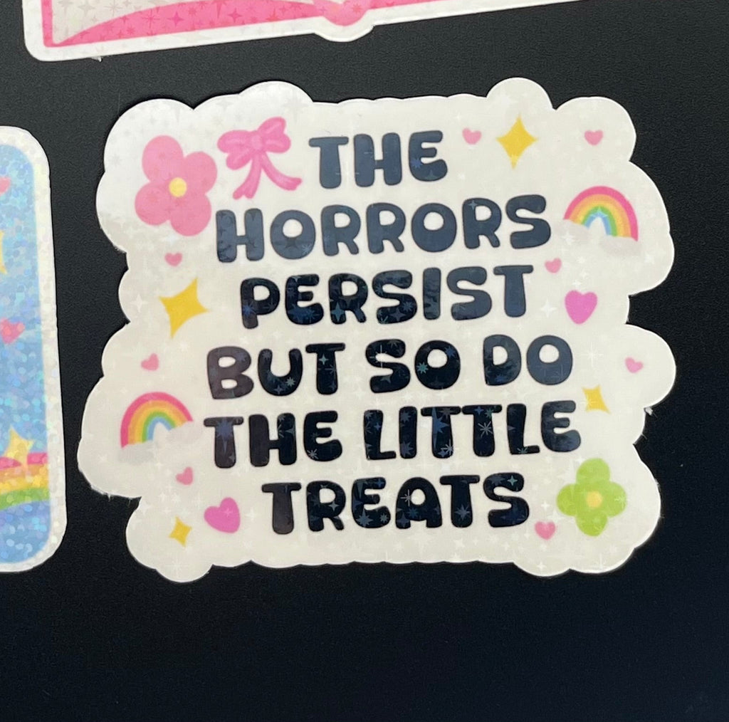 The Horrors Persist But So Do The Little Treats Sticker