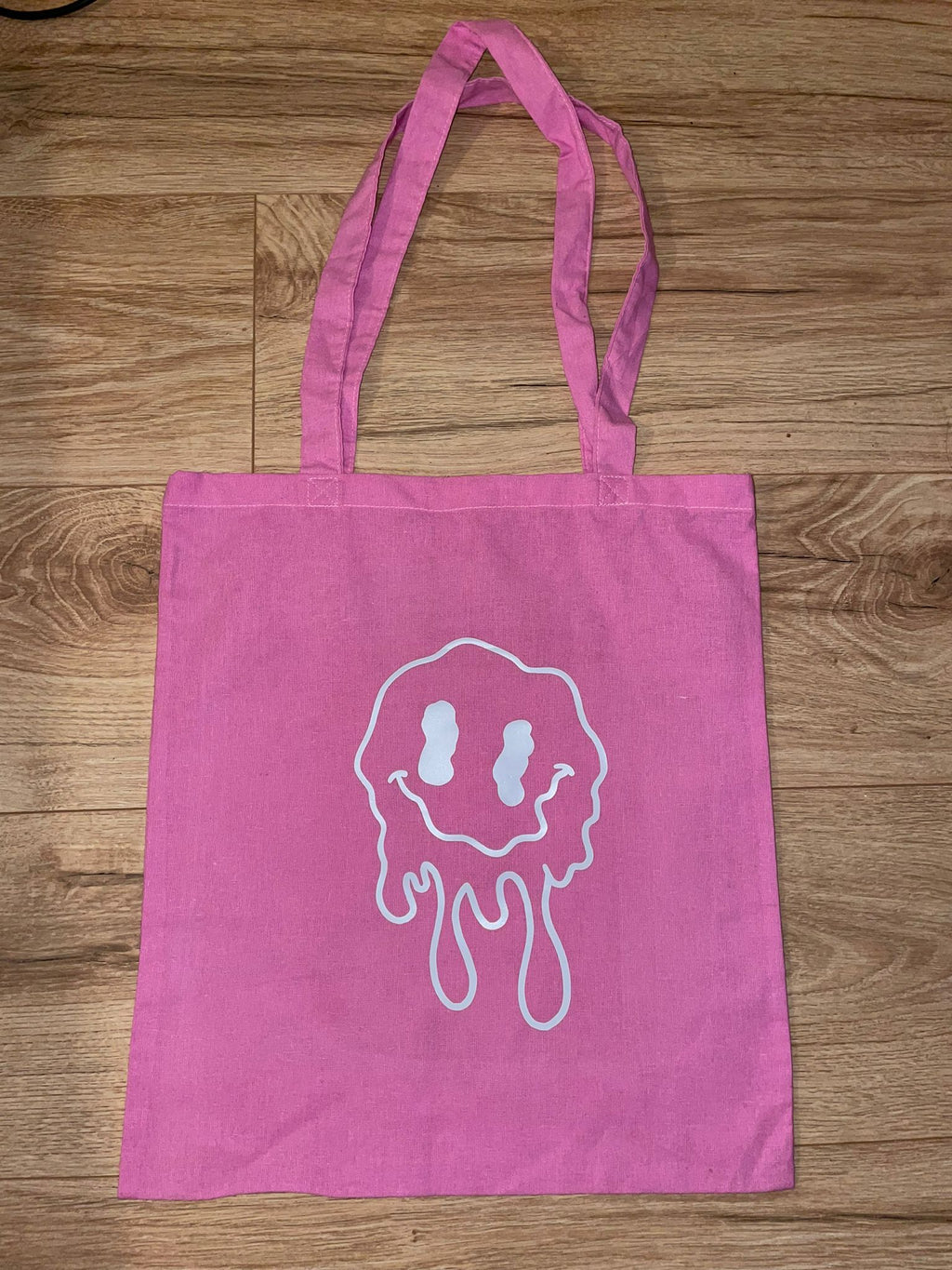 Drippy Smiling Face Tote Bag